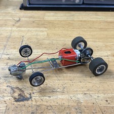 Vintage 1/24 slot car chassis champion chrome rewound motor