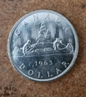 1963 uncirculated Canadian 80% silver dollar