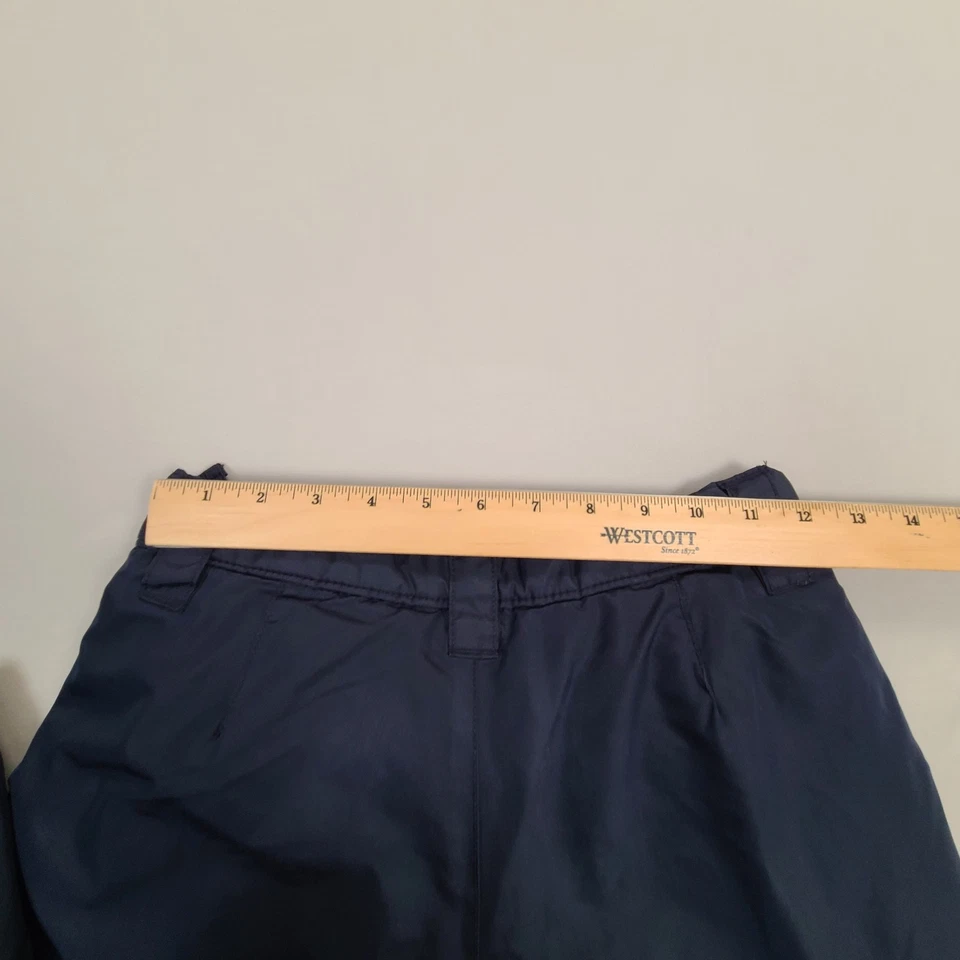 Pantalones antiguos azul marino para niños pantalones de nieve azul medio invierno aire libre aislados impermeables Foto 3 de 4