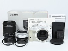 Canon Canon EOS Kiss X7 Rebel SL1 100D 18.0 MP Digital SLR Camera w/Two lenses