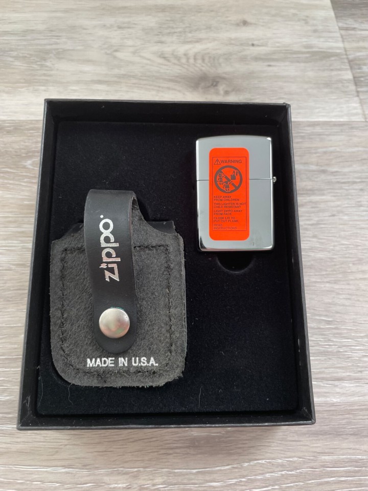 1997 Zippo Viking Harley Davidson polished chrome lighter and belt