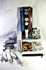 Nintendo Wii Console with Controllers, Dual Glow Saber and 3 Games