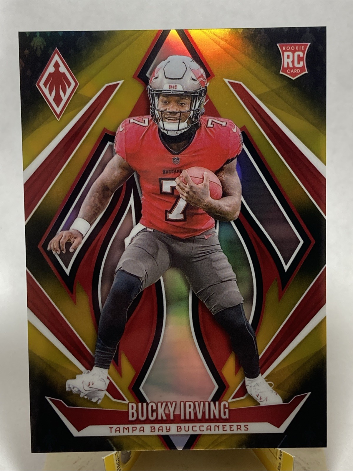 2024 Panini Phoenix - Rookies Bucky Irving #166 Gold Fade /125 RC SP Buccaneers