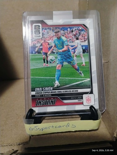 2026 Panini Instant FIFA World Cup #190 Unai Simon Spain card with goal, yellow nameplate, and “Instant” branding.