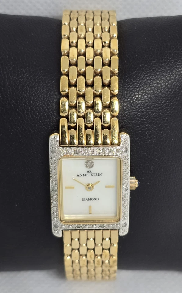 Reloj de cuarzo para mujer Anne Klein diamante tono dorado esfera mop correa 09 Foto 4 de 4