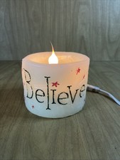 The EverMore Candle Scented Electric Lighted Candle Believe Christmas Decor