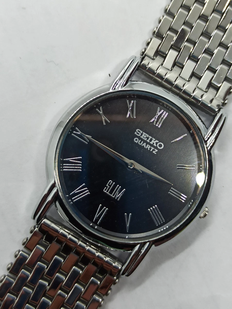 Vintage Seiko Quartz Slim Black Dial 30MM Day Date Men s Watch