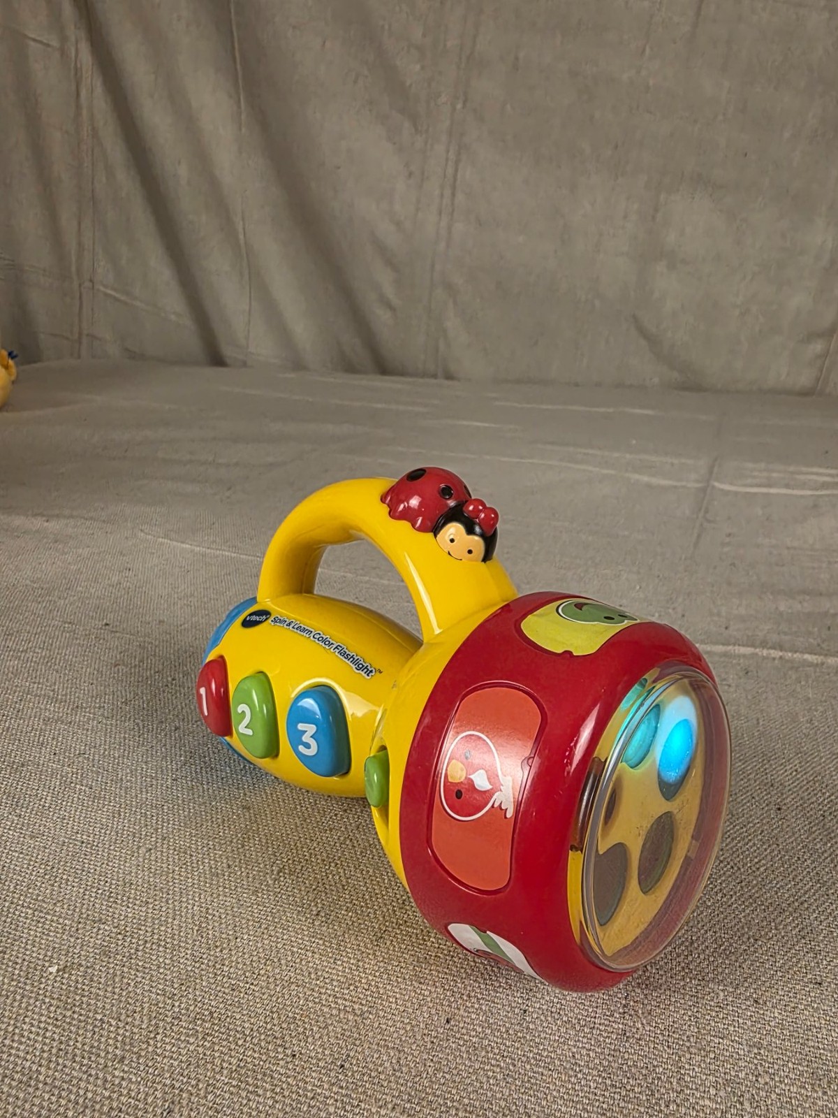 VTech Spin & Learn Color Flashlight Educational Toy with Sounds and Lights