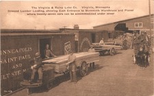 ASERRADERO DE CARGA MADERA virginia mn c1910 postal tala tren lago lluvioso