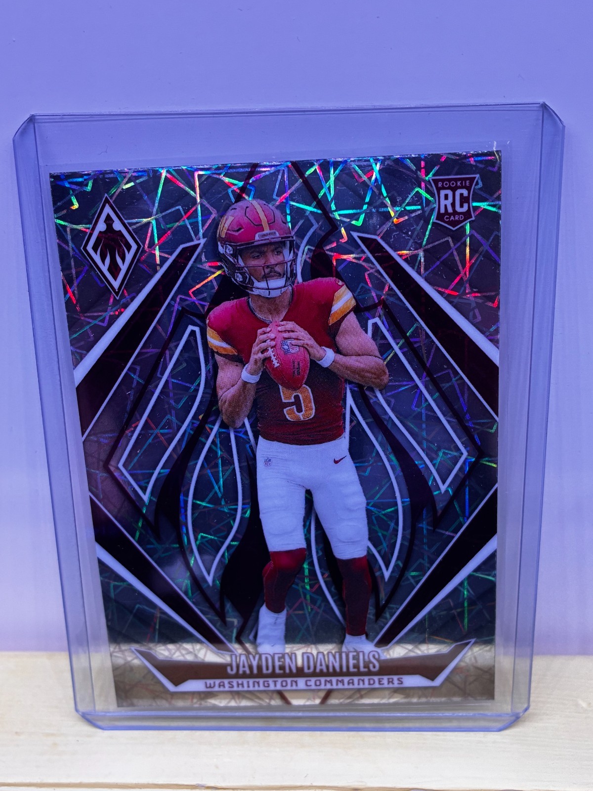 2024 Panini Phoenix Silver Lazer Rookie Card #198 Jayden Daniels