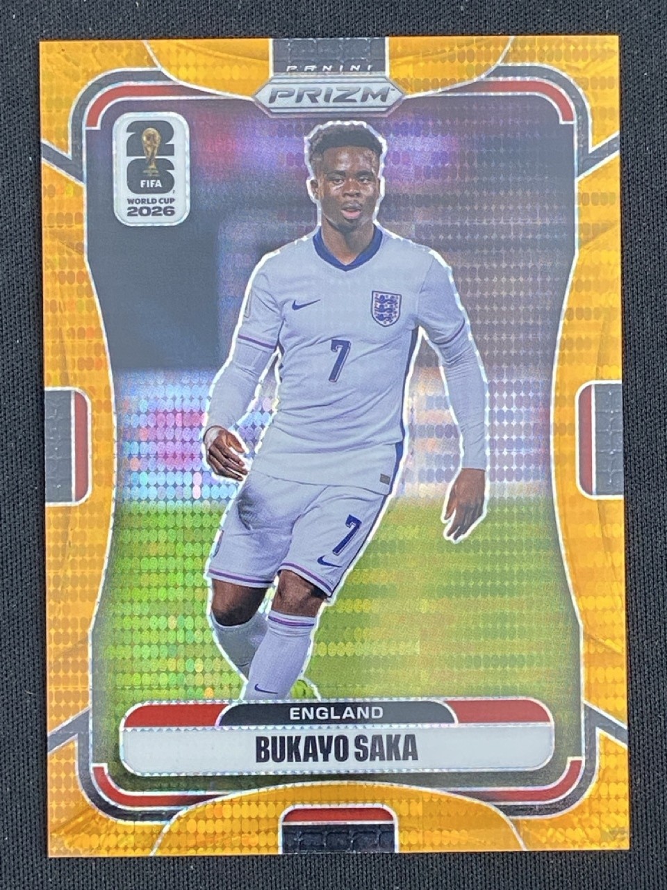 Bukayo Saka 2026 Panini Prizm FIFA World Cup Preferred Orange Base /99 #100