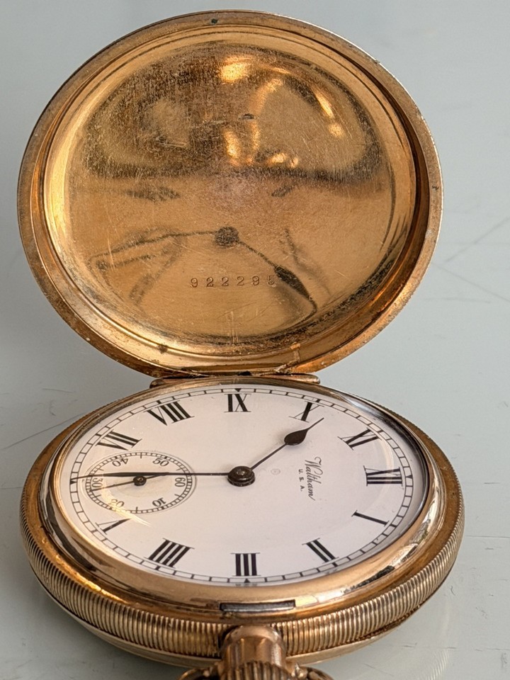 A genuine 1920s Waltham Hunter pocket watch with 14k gold plating — nearly 100 years old and still winding, this is wearable American horological history.