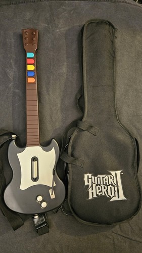 (Used) PS2 Guitar Hero Wired SG Guitar w/Gig Bag (RedOctane, Black/White, READ)