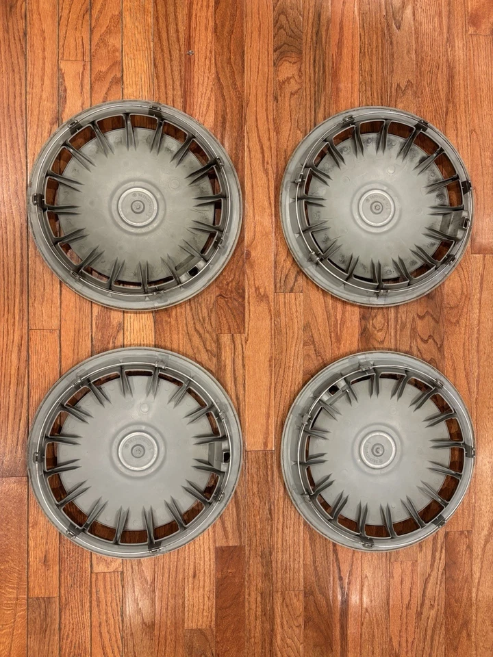 Juego de 4 tapacubos originales BMW E30 318i 325i 14 pulgadas OEM, buen estado Foto 2 de 3