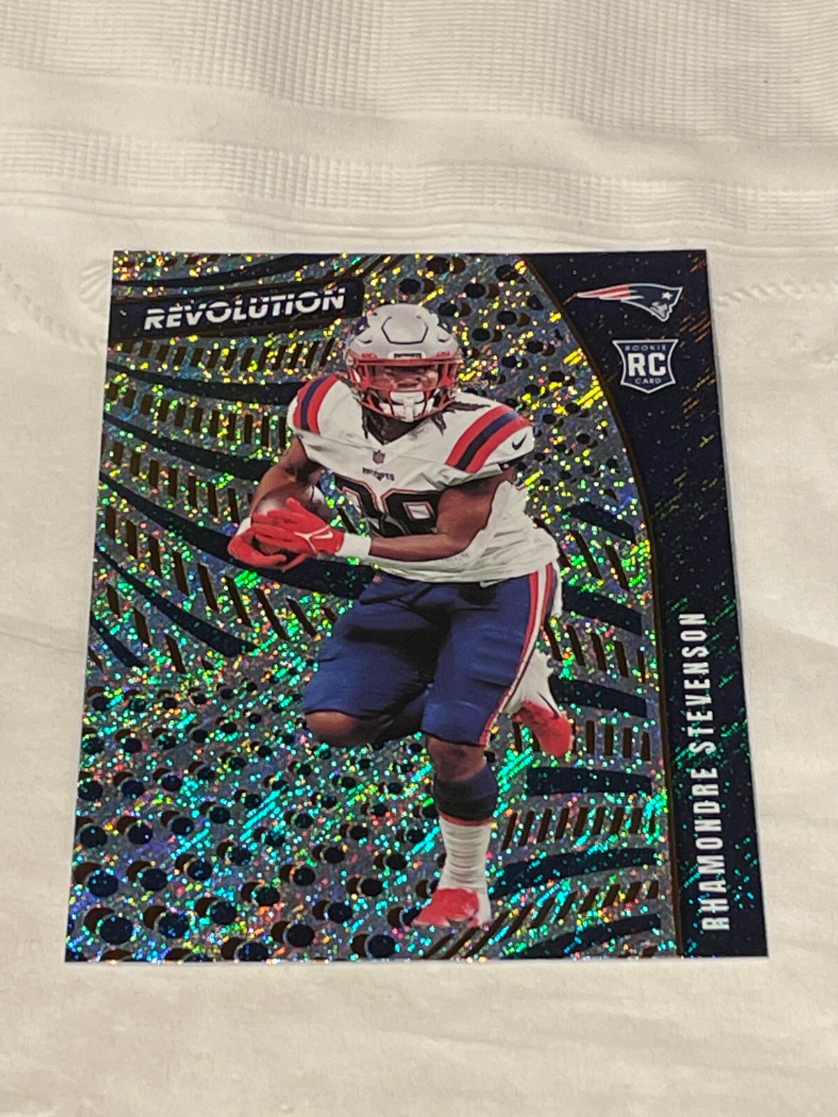 2021 Panini Chronicles Revolution Rhamondre Stevenson #REV-11 Rookie RC
