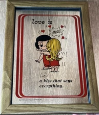 Vintage "Love is...a kiss that says everything" 1970 United Feature Syndicate