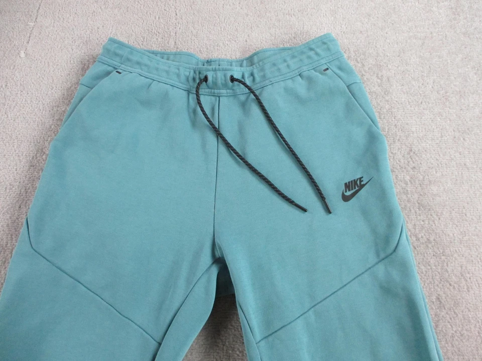 Calça de moletom Nike Tech fleece masculina média verde-azulada atlética CU4495 - Imagem 2 de 4