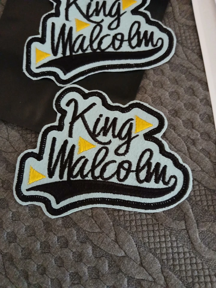 King Malcolm: Sew On Patch: King Malcolm Patch Light Blue Gold Black - Image 3 of 3