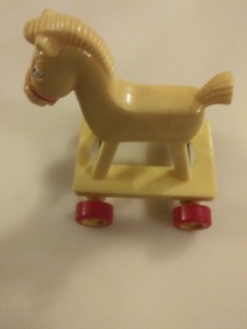 yellow rocking horse