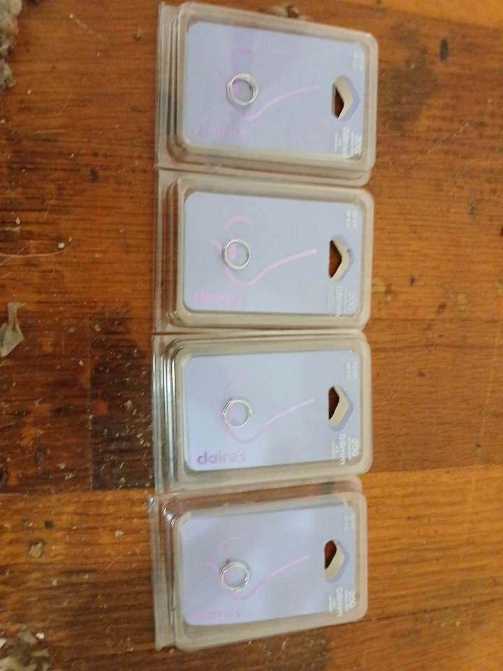 Lote de (4) Anillos Nariz Claire's SS 20g/0.8 mm Precio de venta sugerido por el fabricante 12.99 cada uno! Nuevo con etiquetas Foto 2 de 3