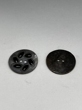Elegant Vintage Plastic Button with Intricate Design alongside Classic Round but