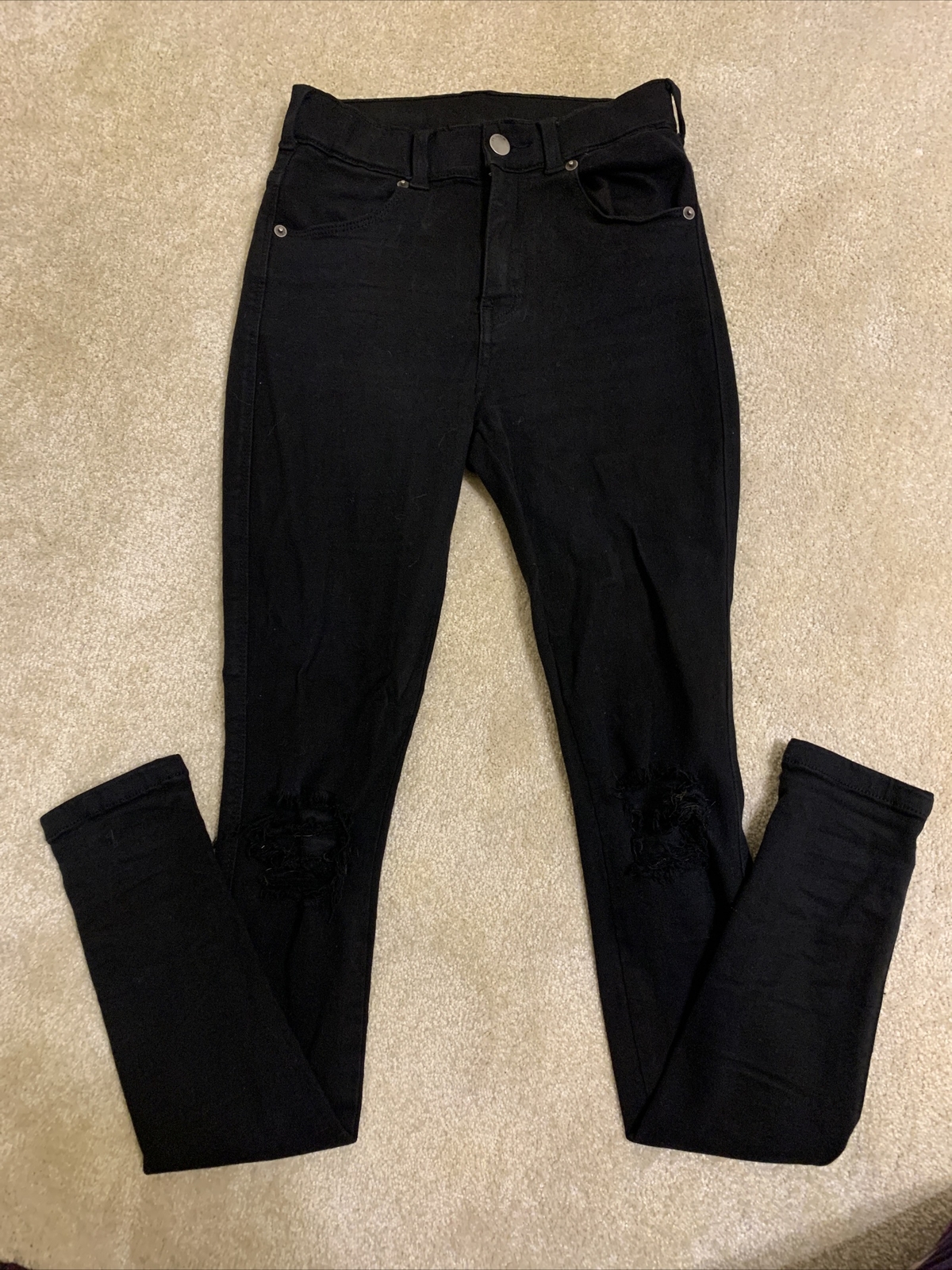 Black Skinny Jeans With Rips In The Knees