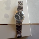 Seiko Quartz Vintage 1970s Date Black Dial Steel Case Silver Bracelet