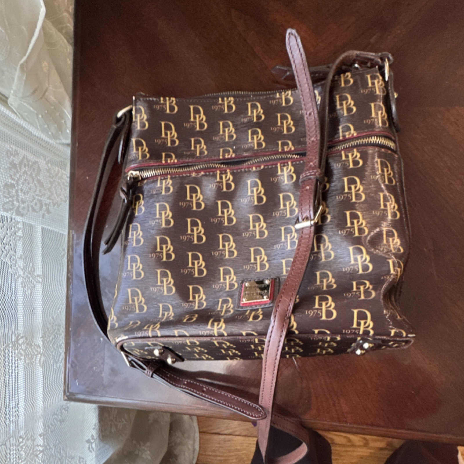 Dooney & Bourke Brown Logo Shoulder Bag Zip Closure Red Lining Adjustable Strap