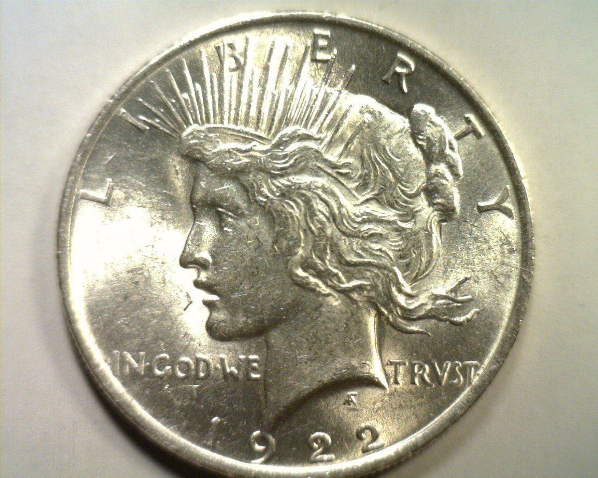 1922 DIE GOUGE IN RAYS PEACE SILVER DOLLAR CHOICE ABOUT