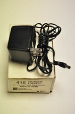 Quantum 415 battery charger for their radio slave model 405R and 505R. NOS.