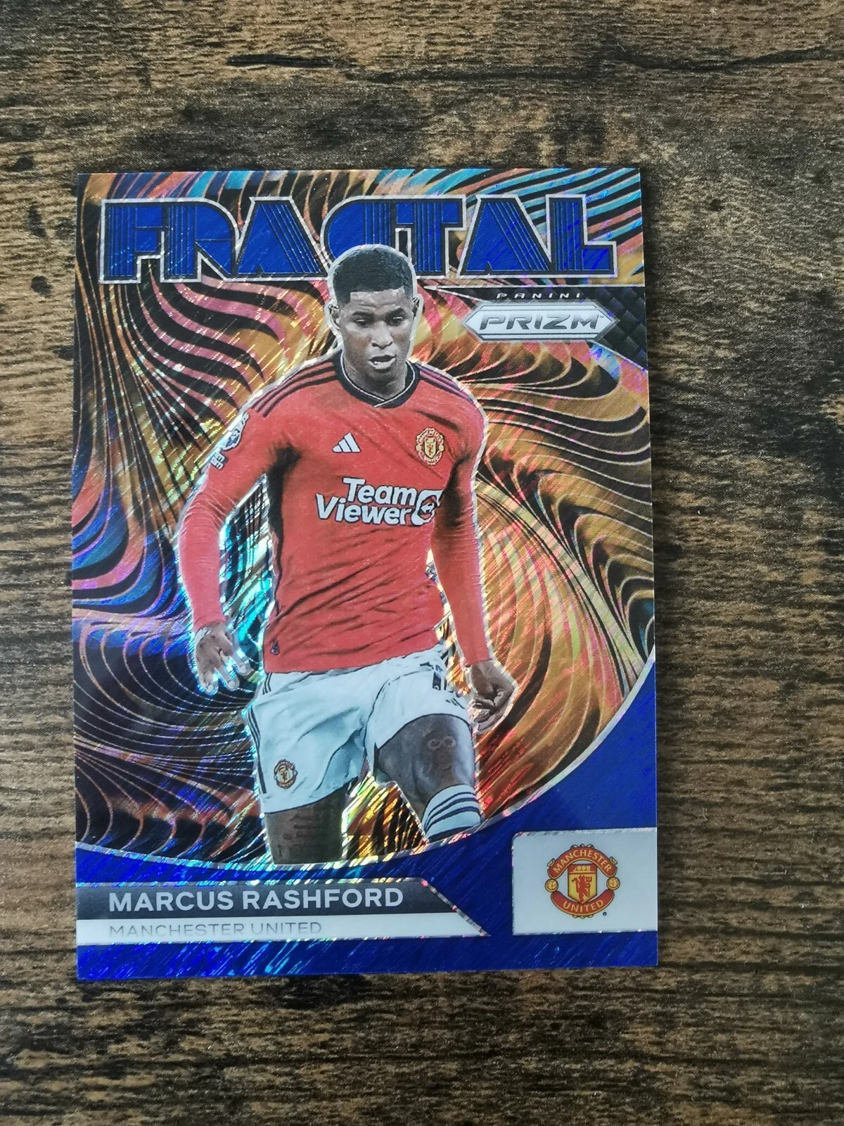 Marcus Rashford /8 Blue Shimmer FOTL Panini Premier League Prizm 2023-24