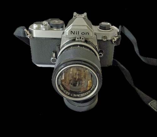 Nikon FM 35mm SLR Film Camera and Nikkor 50mm f1.4 lens and 43-86mm NIKKOR Zoom