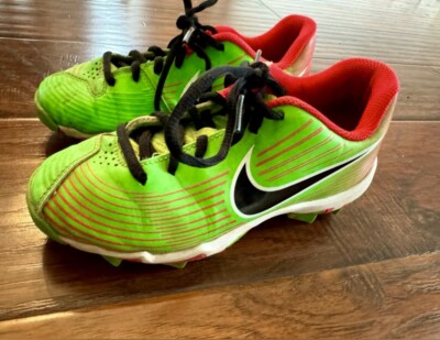 black and green softball cleats