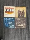 lot of 4 vinyls the beatles and elton john. all play good