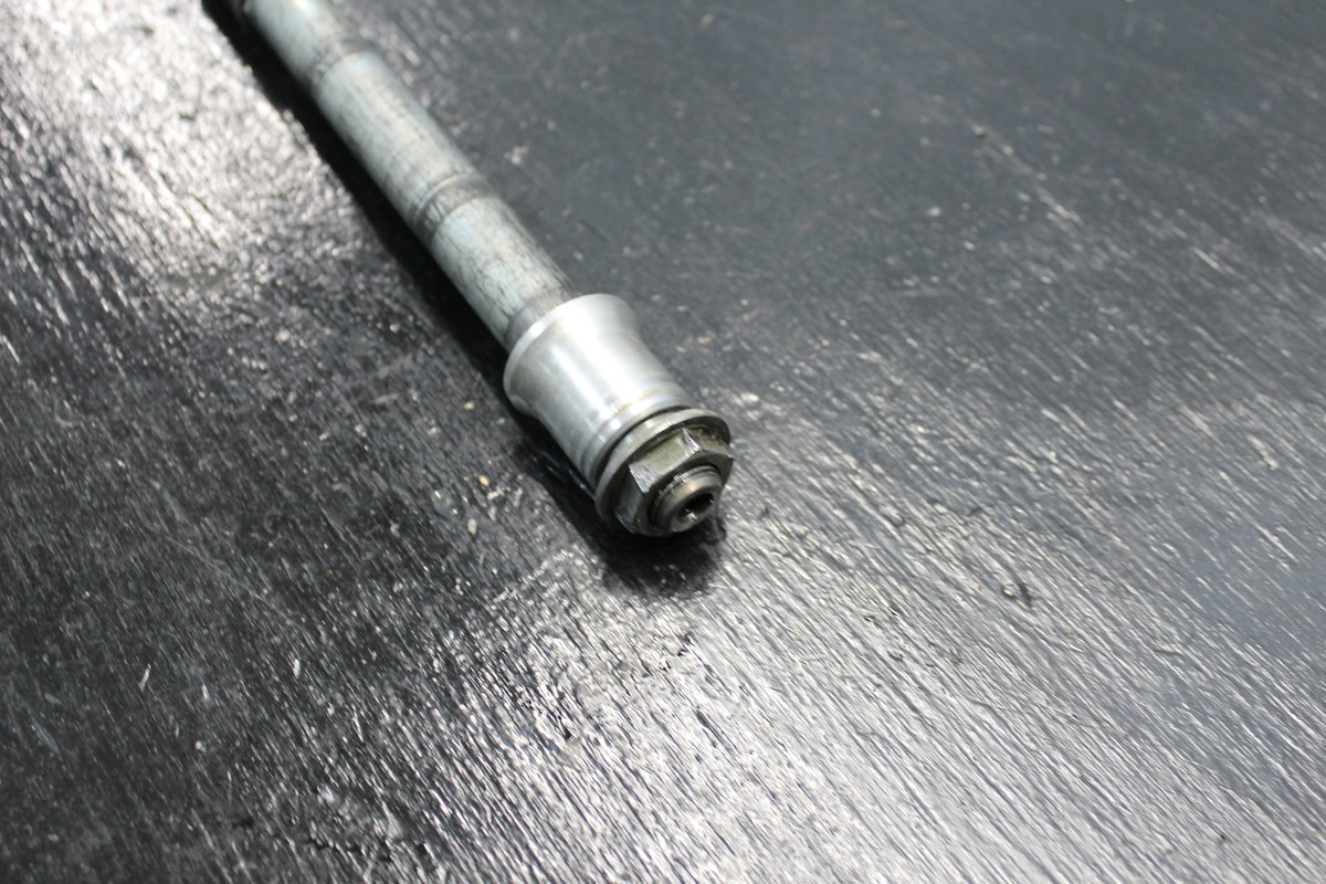 06-19 KAWASAKI ZX14 ZX14R ZX10R FRONT WHEEL RIM AXLE PIVOT BOLT