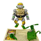 Vintage 1989 TMNT Metalhead Action Figure weapons and profile card