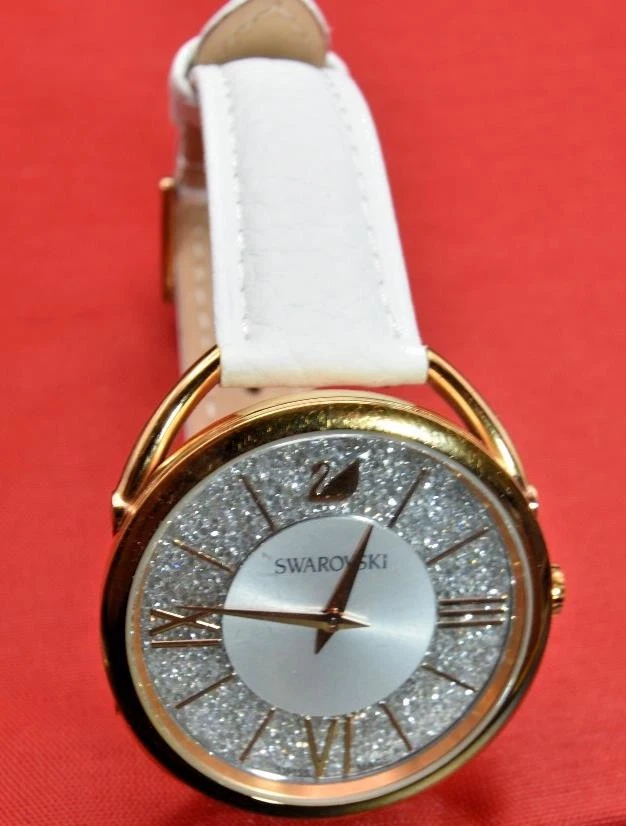 Swarovski Crystalline Ladies Dress Watch Gold Tone White Strap Boxed Working
Opens in a new window o
