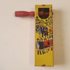 Kirchhof Vintage Tin Noisemaker Yellow Red Orange Carnival Scene 1928