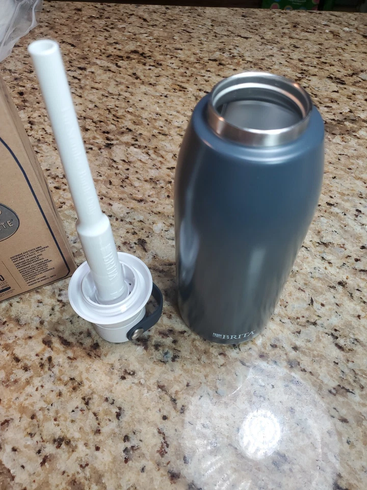 Botella de agua filtrante premium filtro de vacío aislado Brita de acero inoxidable Foto 4 de 4