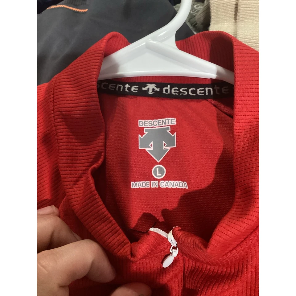 Camiseta deportiva de ciclismo Descente para hombre roja negra kit grande camiseta de ciclismo H2Zero Canadá Foto 2 de 4