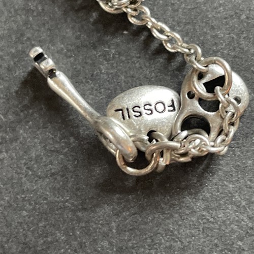 Collana con ciondolo tono argento clessidra fossile catena lunga 29" - Foto 4 di 5