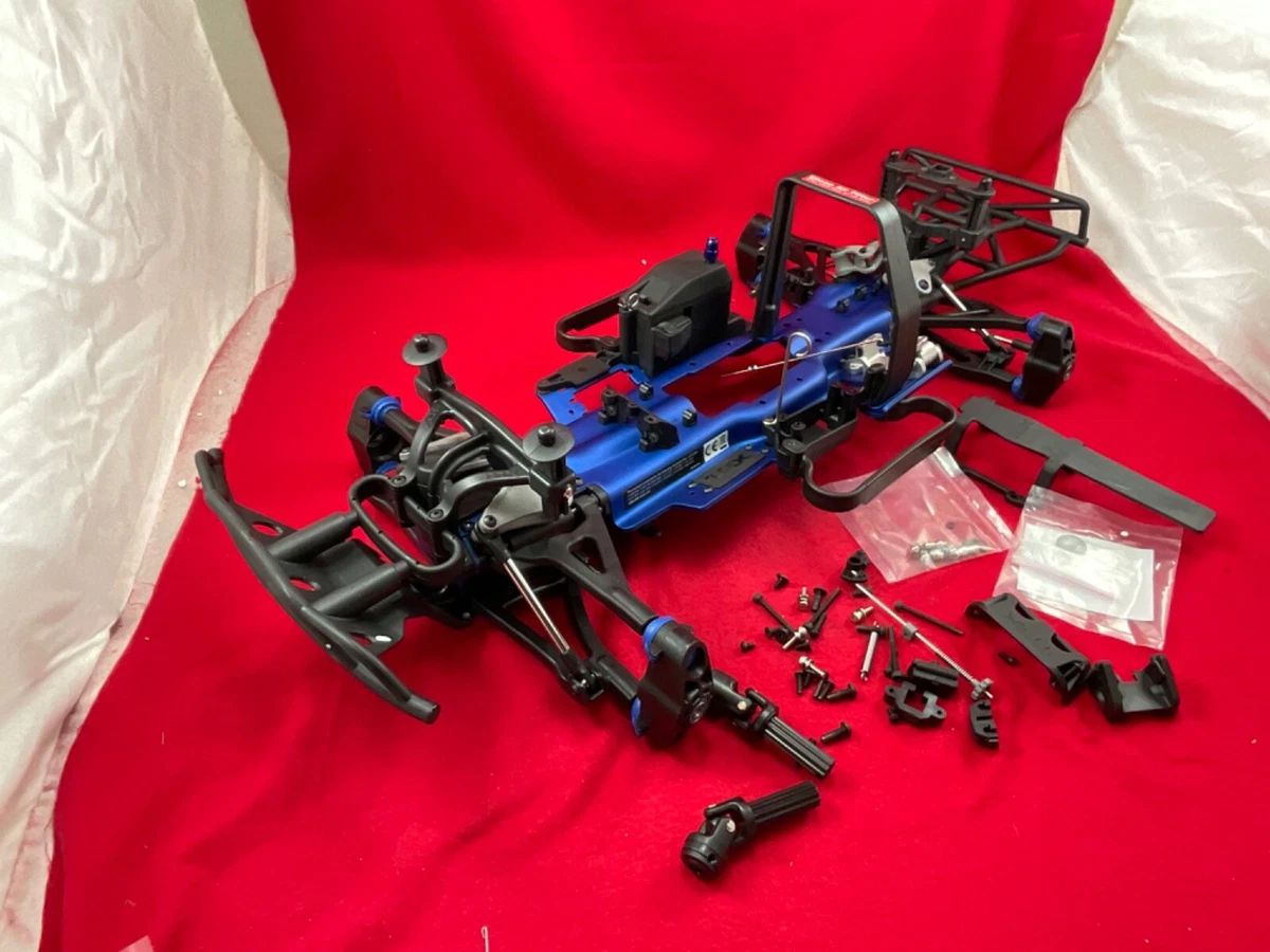 TRAXXAS 59074 SLAYER PRO 4X4 3.3 CHASSIS LOT slider pre roller ARMS DIFFS PARTS