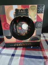 2017 F A O SCHWARZ ORNAMENT LIMITED EDITION RED RIBBON 3.5 IN