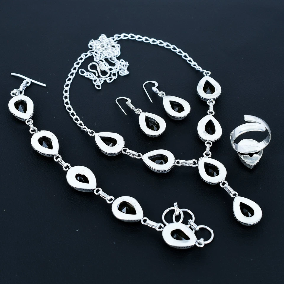 Juego de cuatro piezas de joyería de plata de ley 925 hecho a mano con piedras preciosas de topacio ahumado Foto 4 de 4