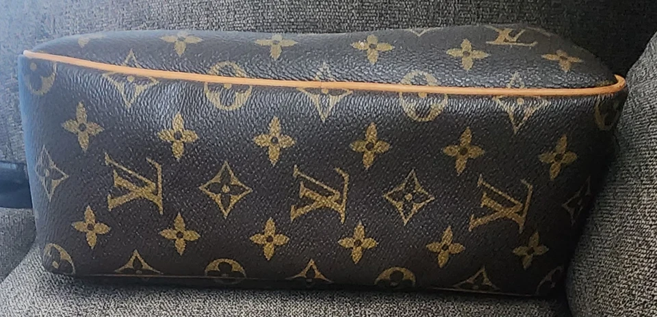 Bolso de aseo Louis Vuitton marrón con monograma usado  Foto 3 de 4