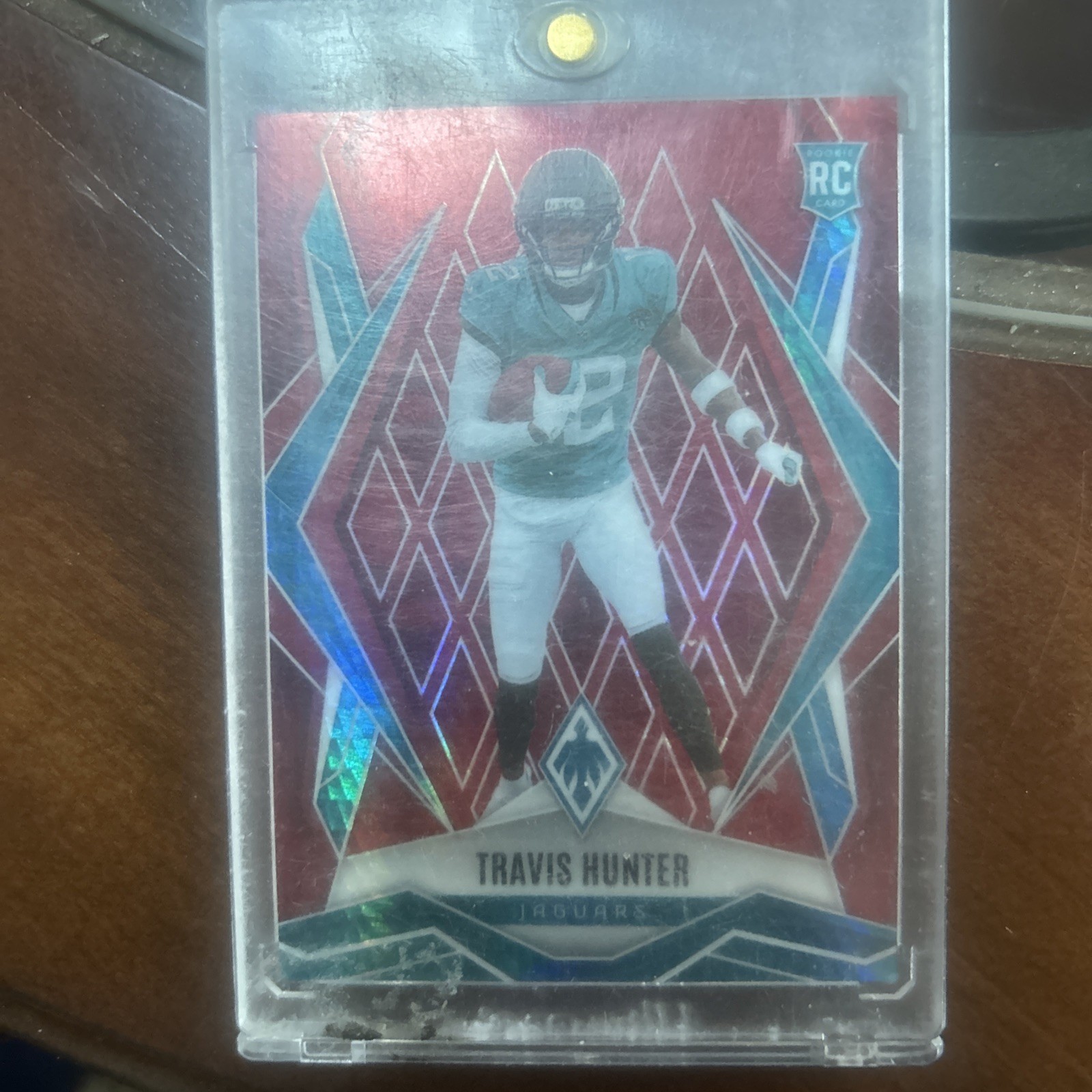 2025 Panini Phoenix - Rookies Travis Hunter #157 Red Hyper /399 (RC)