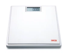 SECA digital floor scale with 150 kg/330 lbs capacity, display in kg/lbs, white
