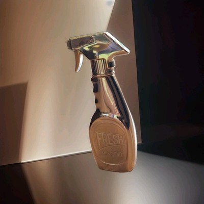 Leere Parfümflasche Moschino  Gold  Fresh Couture zur Deko oder für Sammler