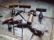 11 alte Korkenzieher  mit Holzgriff,