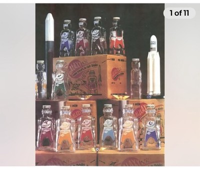 12 SPACEMAN ROBOT, COIN BANK BOTTLES, 1953 SCI-FI BOX FROM GALAXY SPACE FOODS